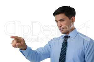 Close up of confident businessman touching invisible interface