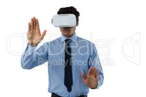 Businessman wearing vr glasses while using invisible interface