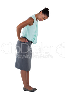 Businesswoman bending and looking down