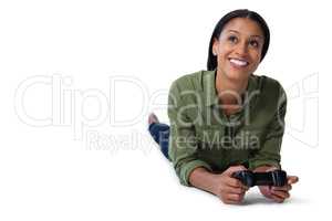 Woman playing video game against white background