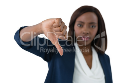Businesswoman showing thumbs down