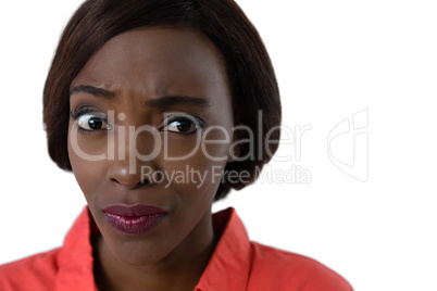 Close up of confused woman making face