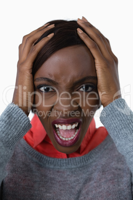 Portrait of young woman shouting