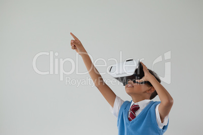 Schoolboy using virtual reality headset