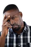 Tensed man against white background