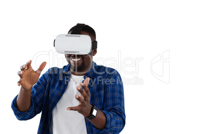 Man gesturing while using virtual reality headset