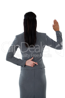 Businesswoman raising her hand