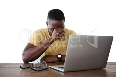 Man using laptop against white background