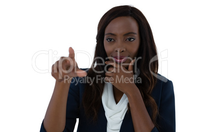 Confused businesswoman with hand on chin using interface screen