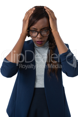 Portrait of businesswoman suffering from headache