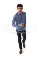 Portrait of businessman running