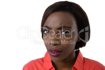 Close up portrait of confused young woman