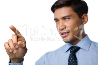 Confident young businessman using invisible interface