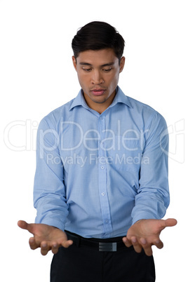 Young businessman gesturing