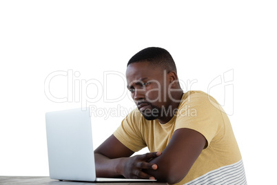 Man using laptop against white background