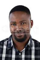 Happy man standing against white background