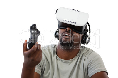 Man using virtual reality headset and playing video game