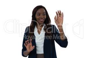 Smiling young businesswoman using interface screen
