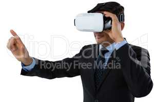 Businessman gesturing while using vr glasses