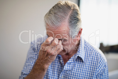 Close-up of worried senior male patient