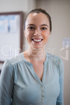 Portrait of cheerful female therapist