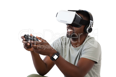 Man using virtual reality headset and playing video game