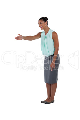 Smiling businesswomen giving her hand for handshake