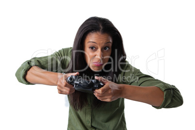 Woman making funny faces while playing video games