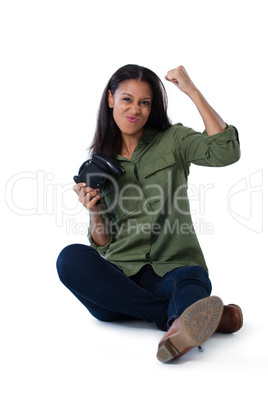 Excited woman playing video games