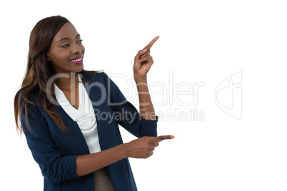 Smiling businesswoman gesturing during presentation