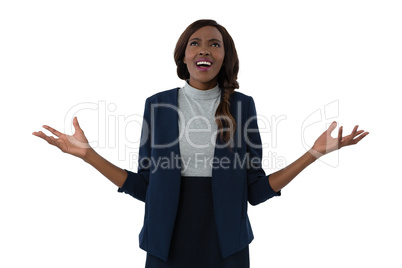 Businesswoman gesturing while shouting