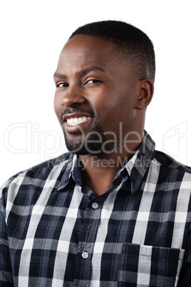 Happy man standing against white background