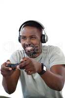 Man playing video game against white background