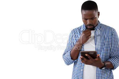 Man using digital tablet against white background