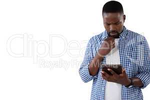 Man using digital tablet against white background