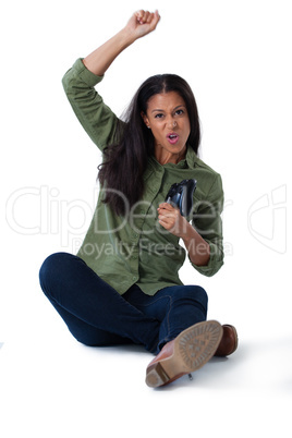 Excited woman playing video games