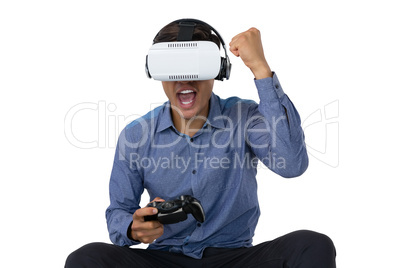 Businessman using vr glasses while playing video game