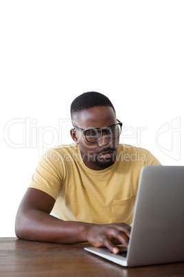 Man using laptop against white background