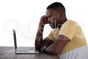 Man using laptop against white background