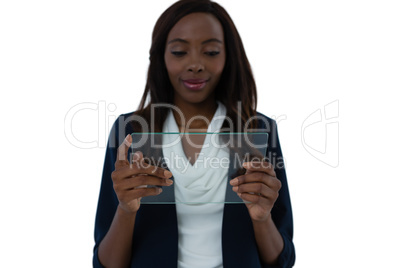 Smiling businesswoman holding transparent interface screen