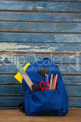 Various supplies in schoolbag