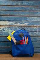 Various supplies in schoolbag