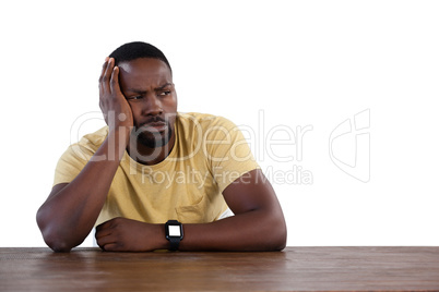 Upset man against white background