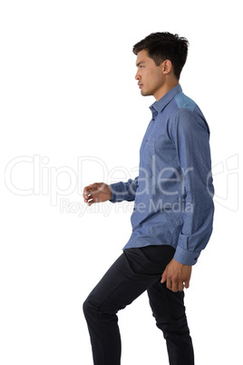 Side view of businessman walking