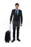 Portrait of businessman with luggage