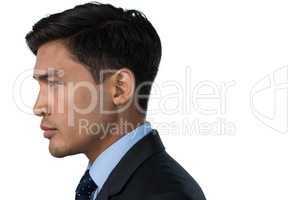 Side view of businessman looking away