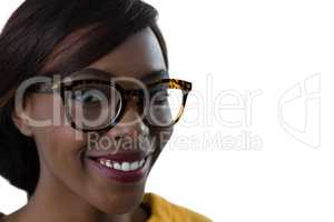 Close up portrait of smiling young woman wearing eyeglasses