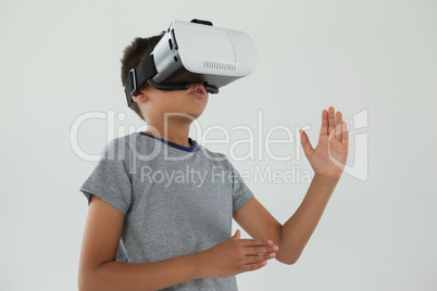 Schoolboy using virtual reality headset