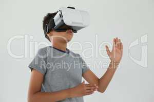 Schoolboy using virtual reality headset