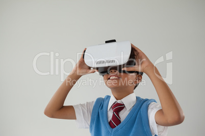 Schoolboy using virtual reality headset